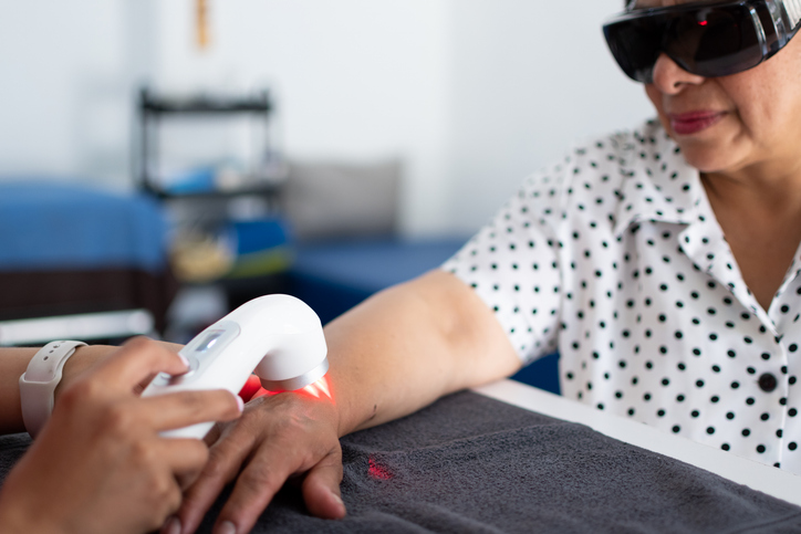 Low level cold laser therapy reducing inflammation and pain in Redmond